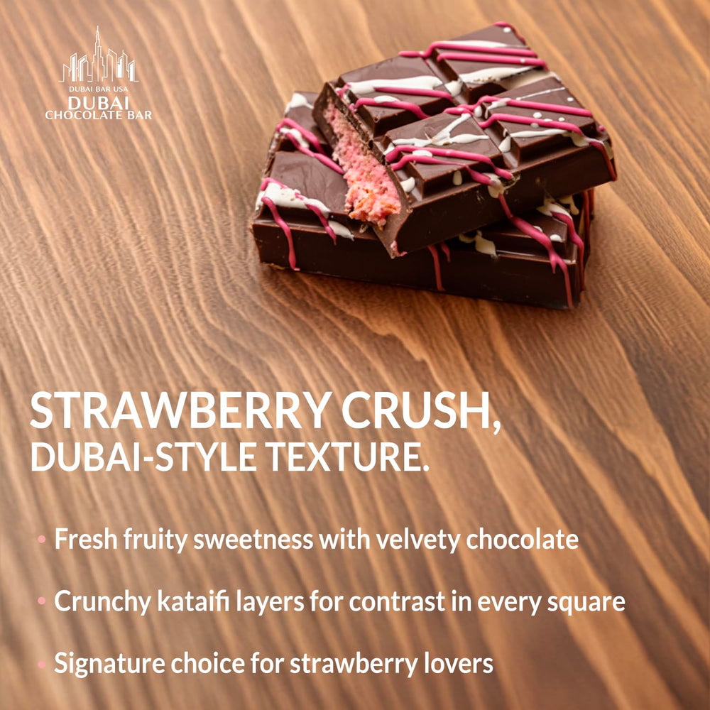 Sliced Dubai Choco Strawberry Crush reveals strawberry cream and chocolate layers.