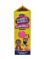 Dubble Bubble gumballs close-up shows chewy texture and vibrant pink color.