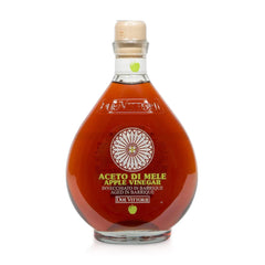 Due Vittorie apple vinegar bottle on a wooden table, ideal for everyday cooking