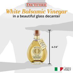 Due Vittorie Dolceto White Balsamic Dressing being drizzled on a fresh salad.