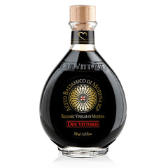 Due Vittorie Oro Gold bottle with cork pourer for controlled drizzle over dishes.
