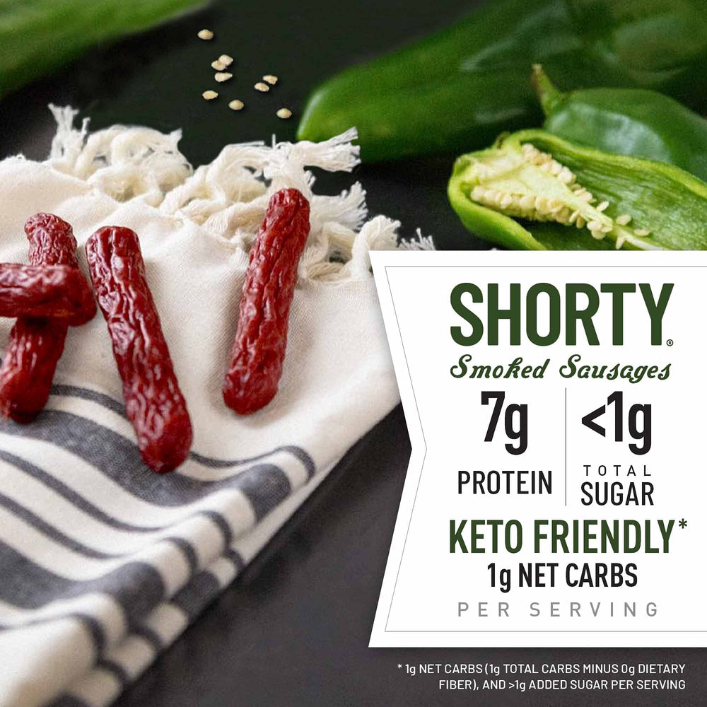 Close-up of Duke's Shorty Sausages with visible Hatch chile bits.