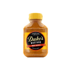 Duke's Smoky Chipotle Mustard bottle pour highlights bold smoky flavor on sandwiches.