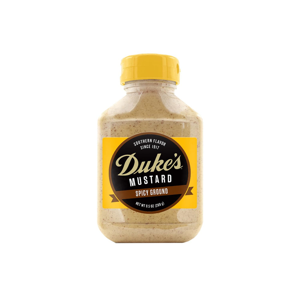 Duke's Spicy Ground Mustard bottle pour highlights bold, creamy heat for sandwiches