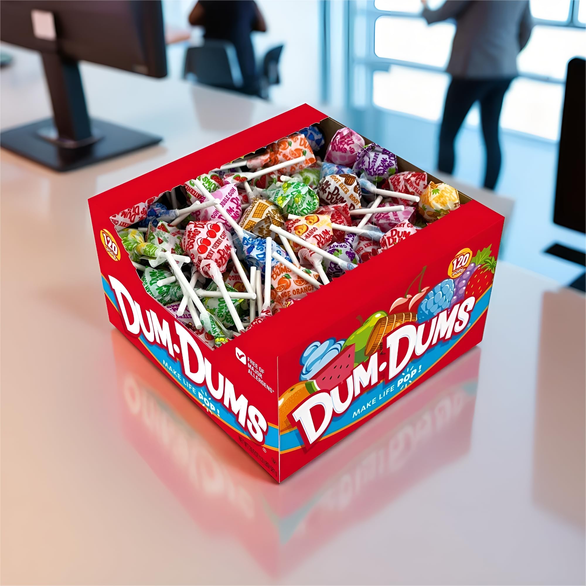 Classic Dum Dums flavors visible on wrappers for nostalgic snacking.