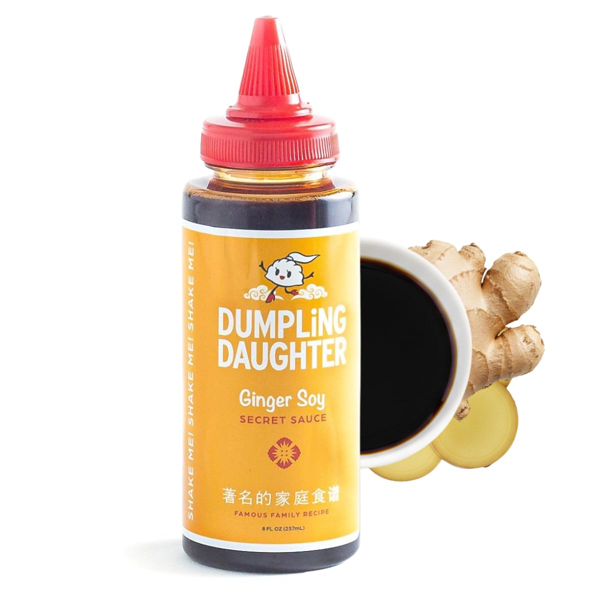 Dumpling Daughter ginger-infused soy sauce bottle poured over dumplings for depth