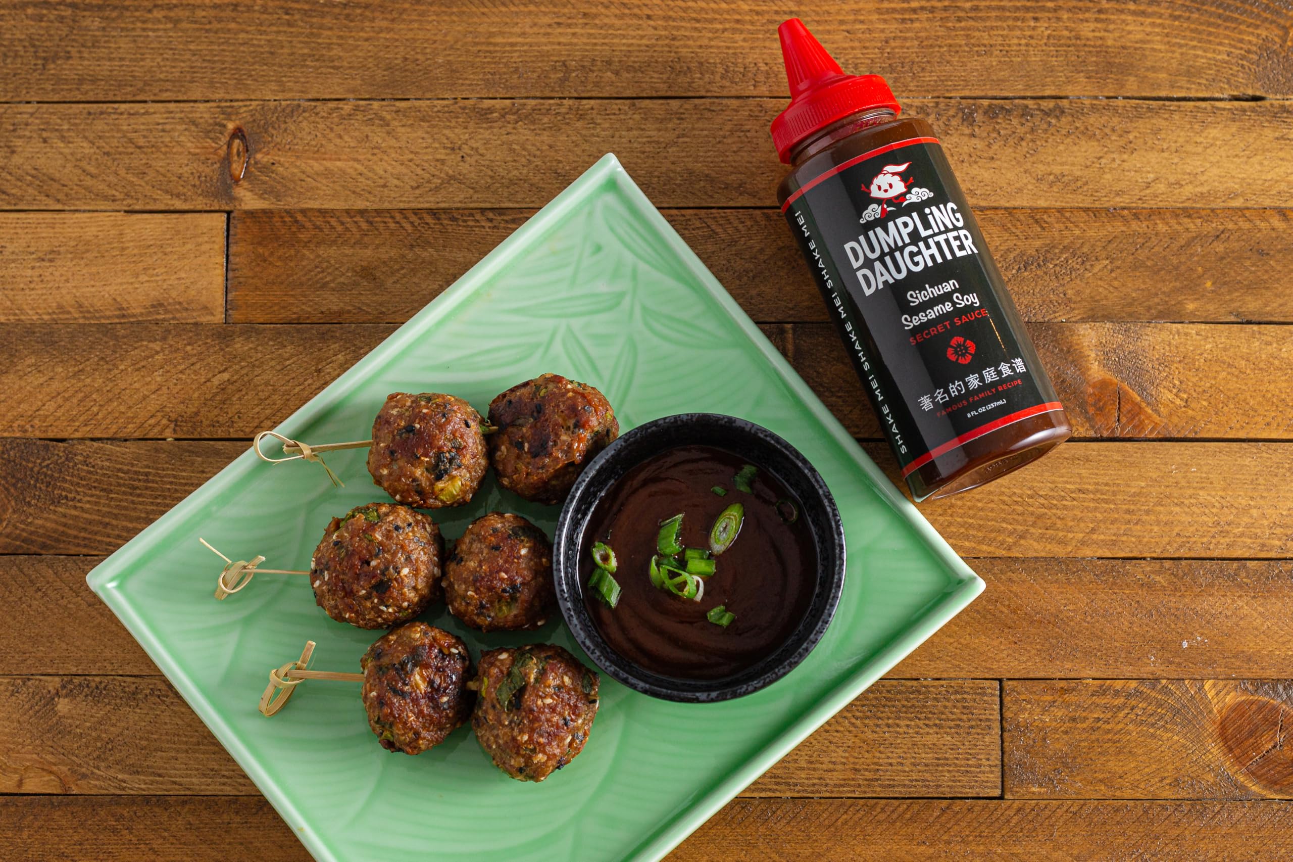 Dumpling Daughter sauce glaze on wings for bold heat and flavor.