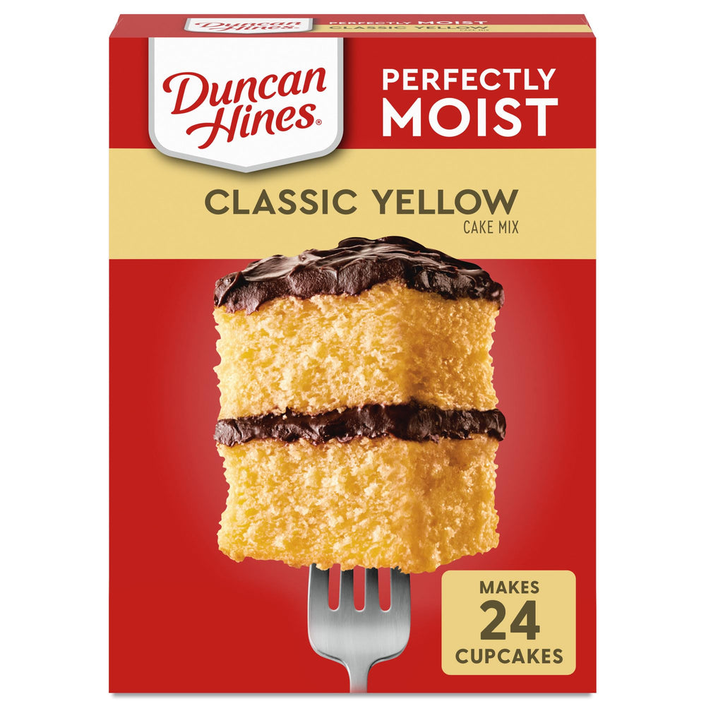 Duncan Hines Classic Yellow Cake Mix box on a sunny kitchen counter, ideal for Easter desserts.