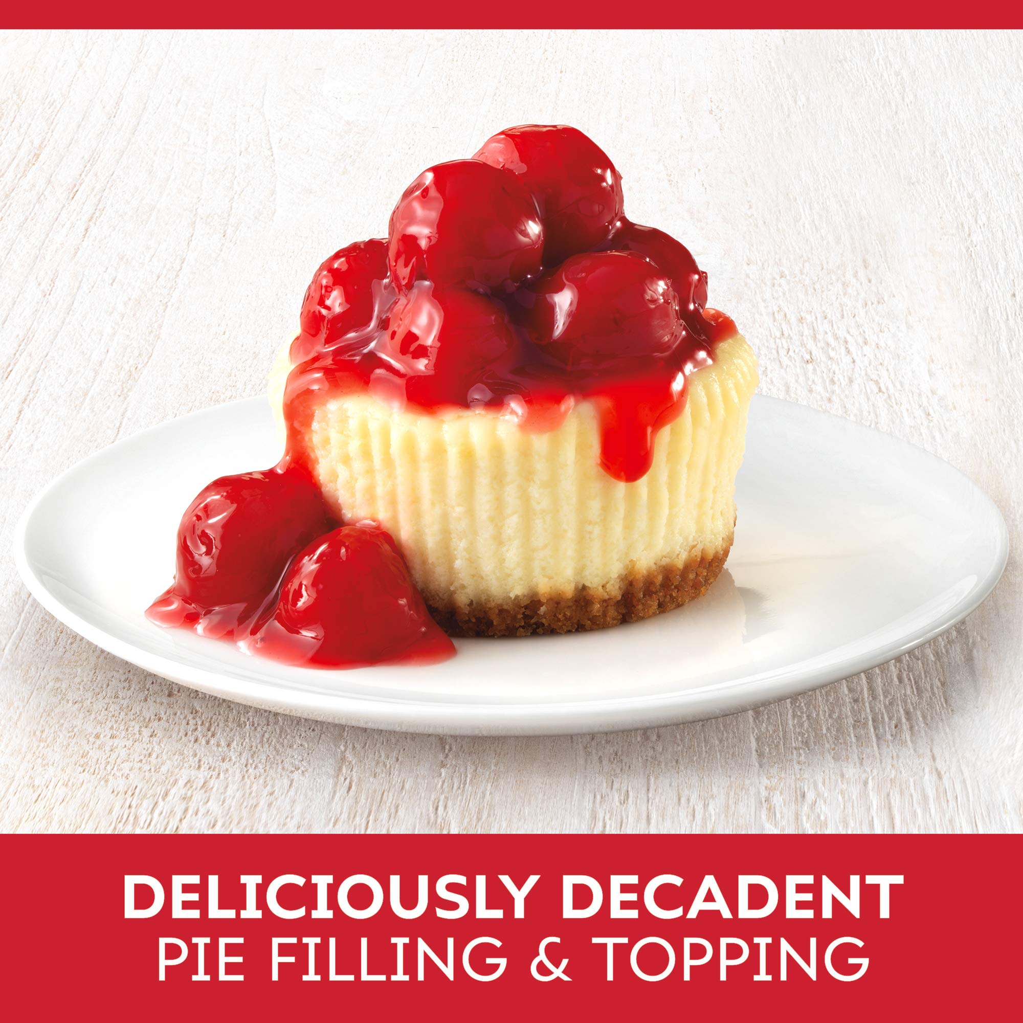 Duncan Hines Comstock cherry pie topping swirled on vanilla ice cream
