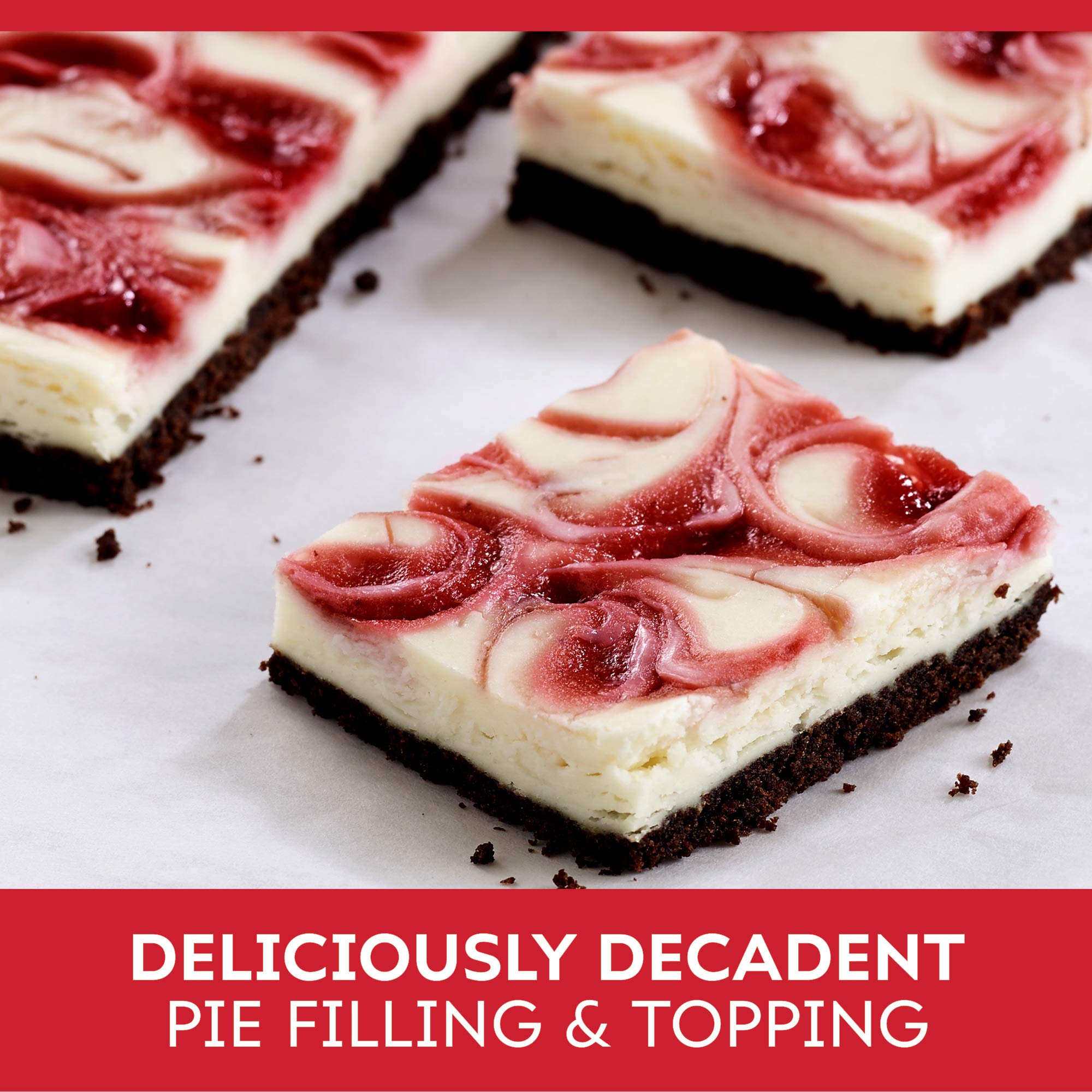 Duncan Hines Comstock Raspberry Pie Filling close-up shows bright berry texture.