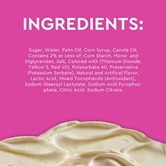 Duncan Hines Creamy Cream Cheese Frosting topping cake layers with a creamy texture.