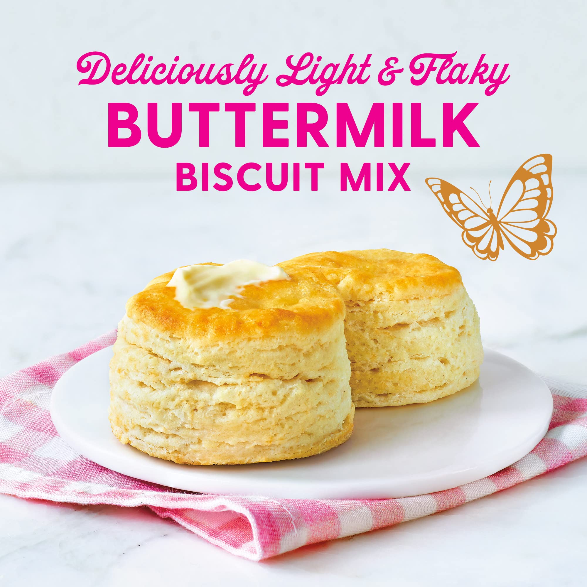 Duncan Hines Dolly Parton's Biscuit Mix steaming with golden flaky biscuits.