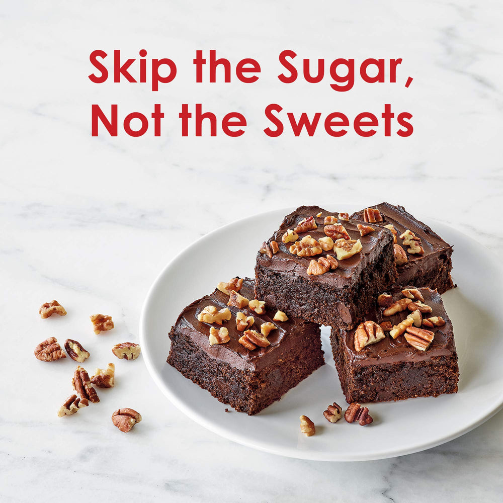 Gluten-free label on Duncan Hines brownie mix box communicates dietary suitability.