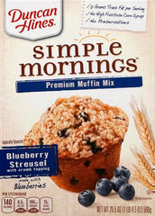 Duncan Hines batter being poured into a muffin pan