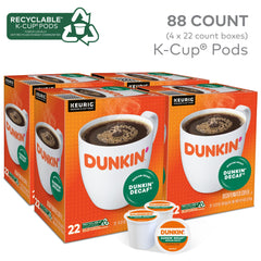 Dunkin Donuts decaf K-Cup pods closeup highlighting rich flavor.