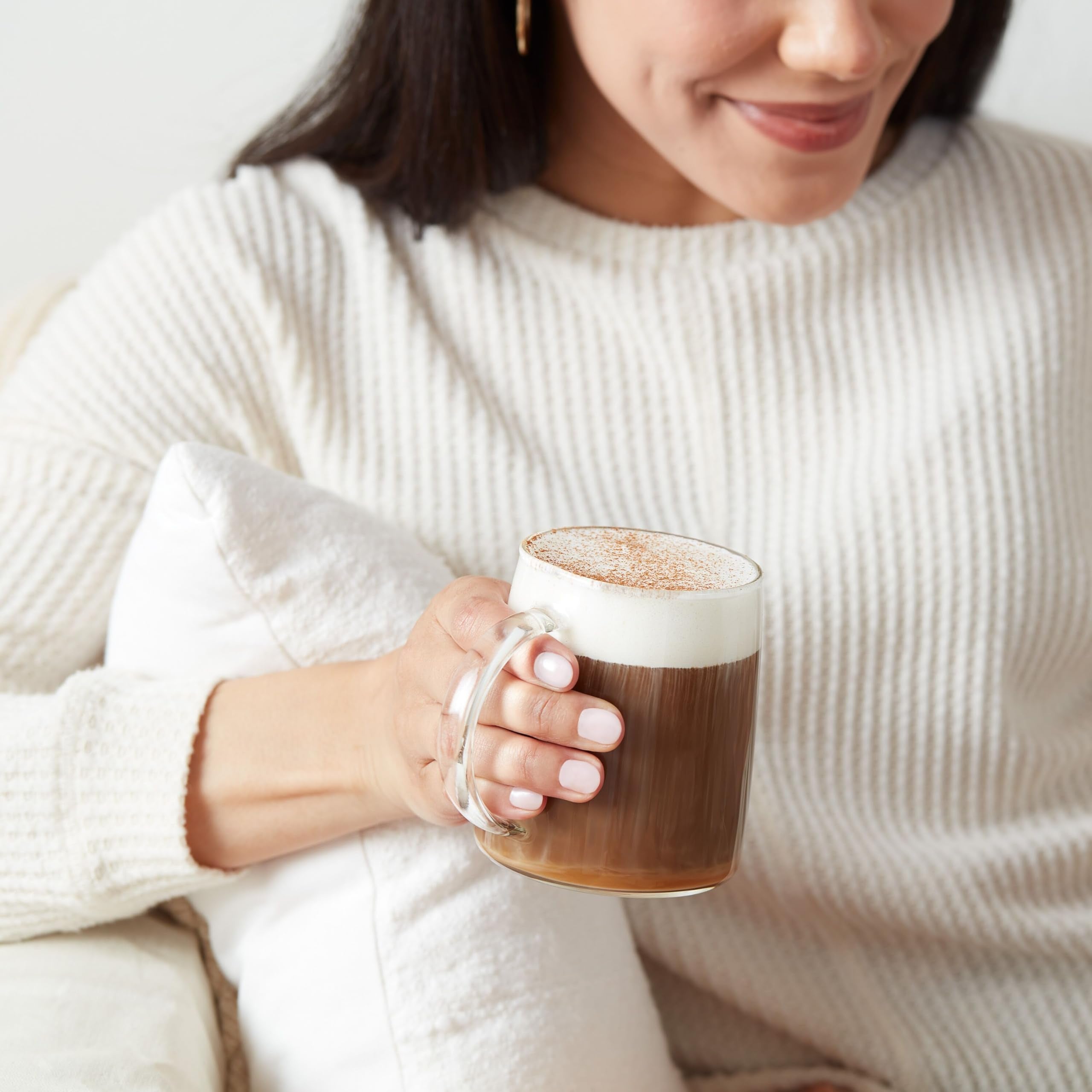 Dunkin Original Blend coffee pouring into cup, inviting fragrant steam.