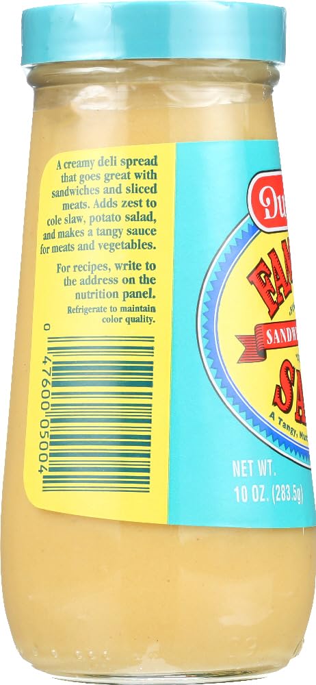 Durkee Famous Sauce on a sandwich assembly for tangy, creamy flavor enhancement.