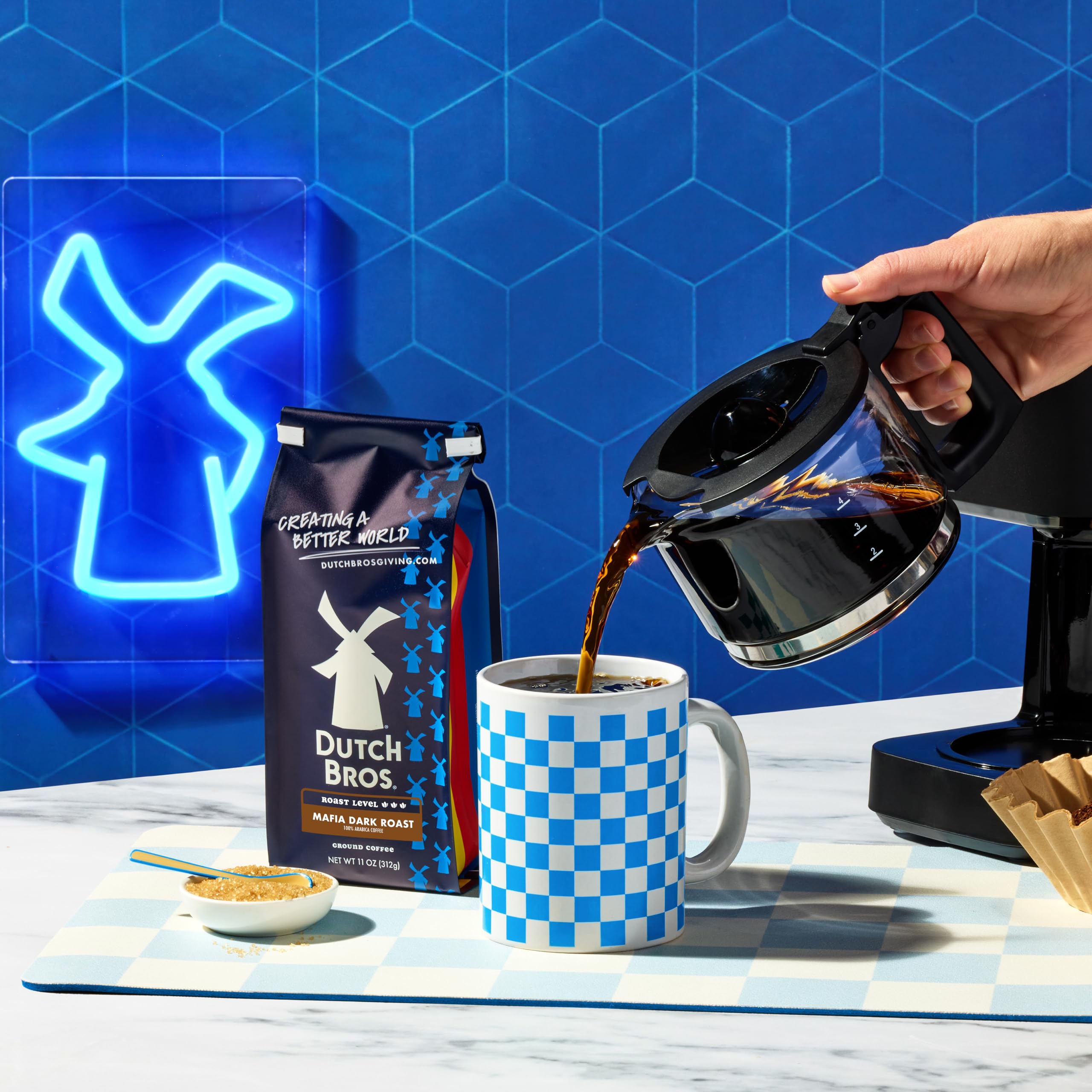 Dutch Bros Mafia Dark Roast packaging open on kitchen counter.