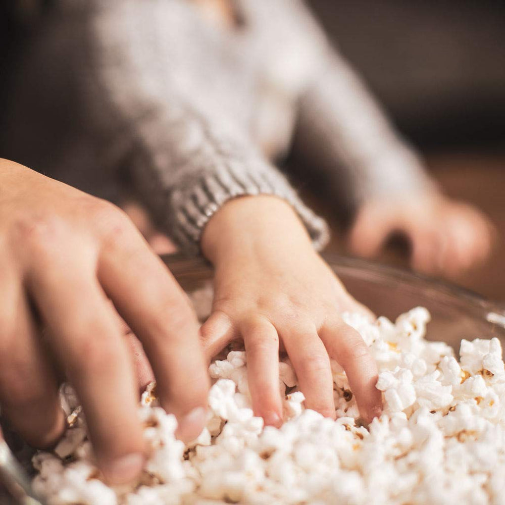 Dutchman's White Popcorn sourced from America's Heartland for wholesome kernels.