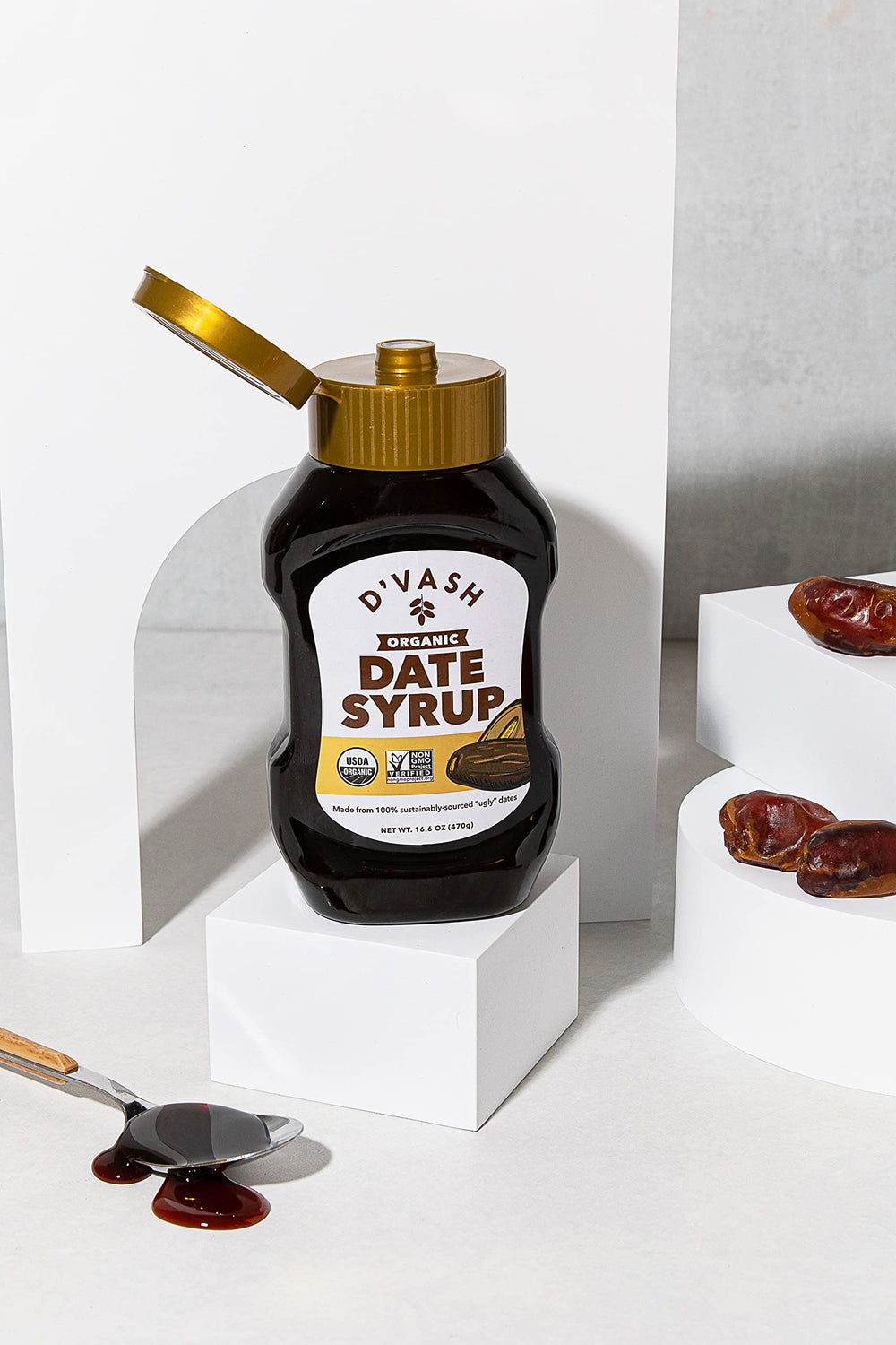 D'Vash Date Syrup on pancakes with caramel-like drizzle