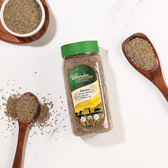 DWARAKA Ajwain seeds in a spice bowl for aromatic flavor in Indian dishes.