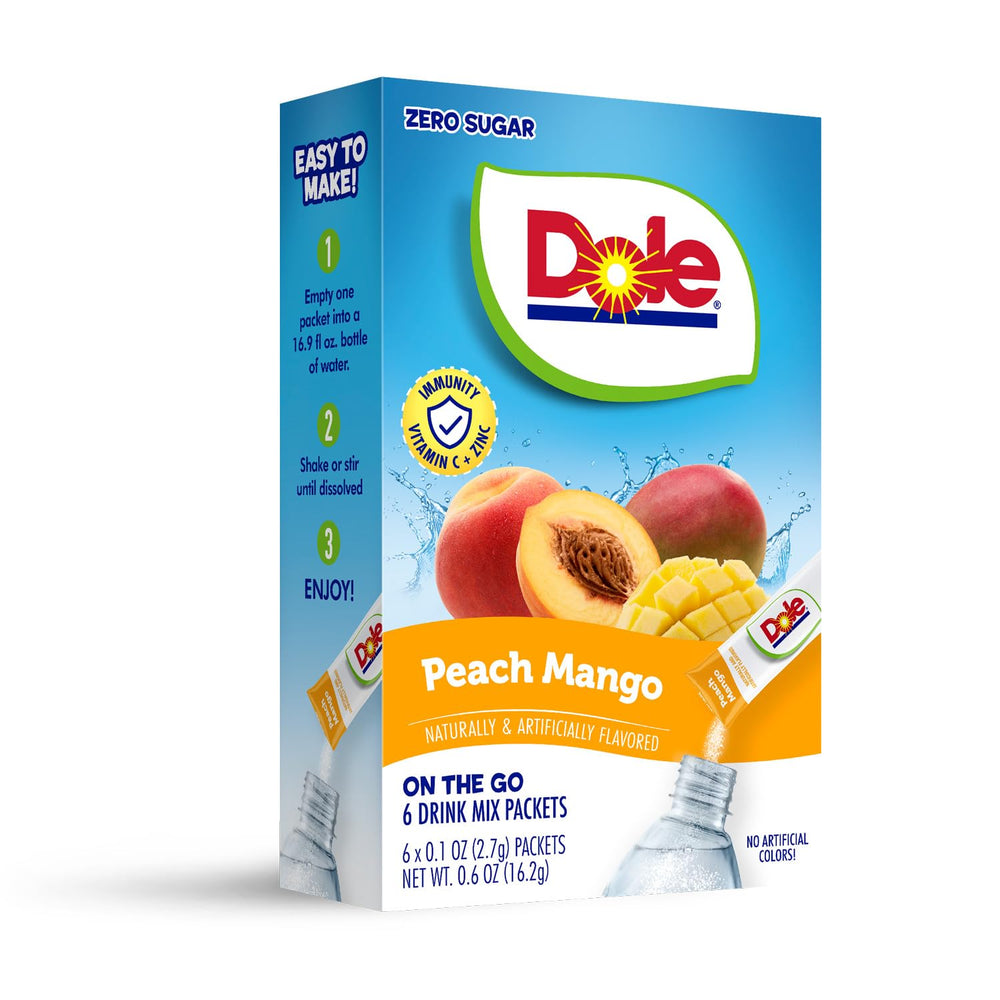 Stirring DYLA Dole Peach Mango powder into a glass with a straw