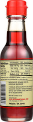 Dynasty Premium Hot Sesame Oil pour close-up highlighting rich aroma enhances dishes.