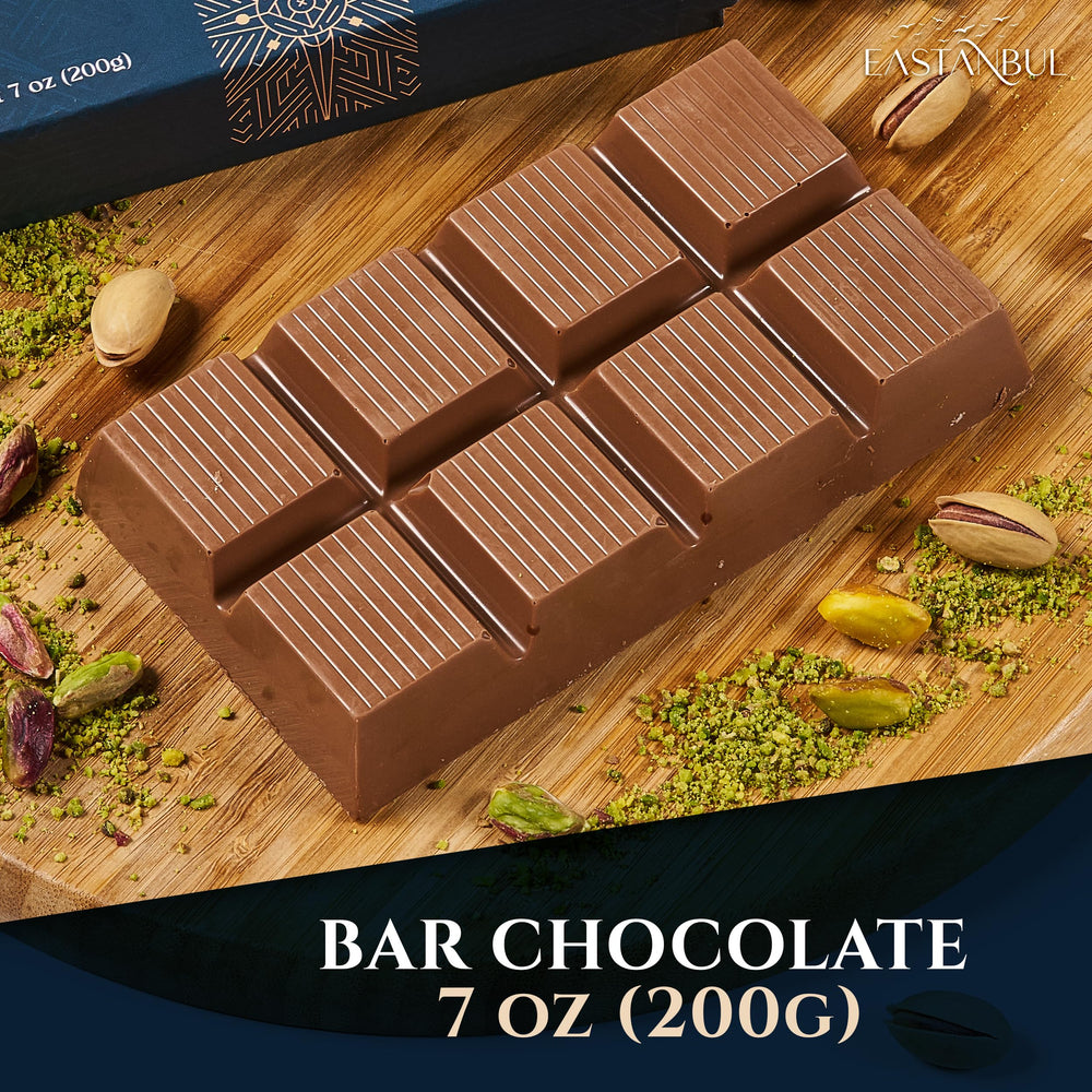 Belgian chocolate coating melting smoothly against pistachio cream in Eastanbul bar.