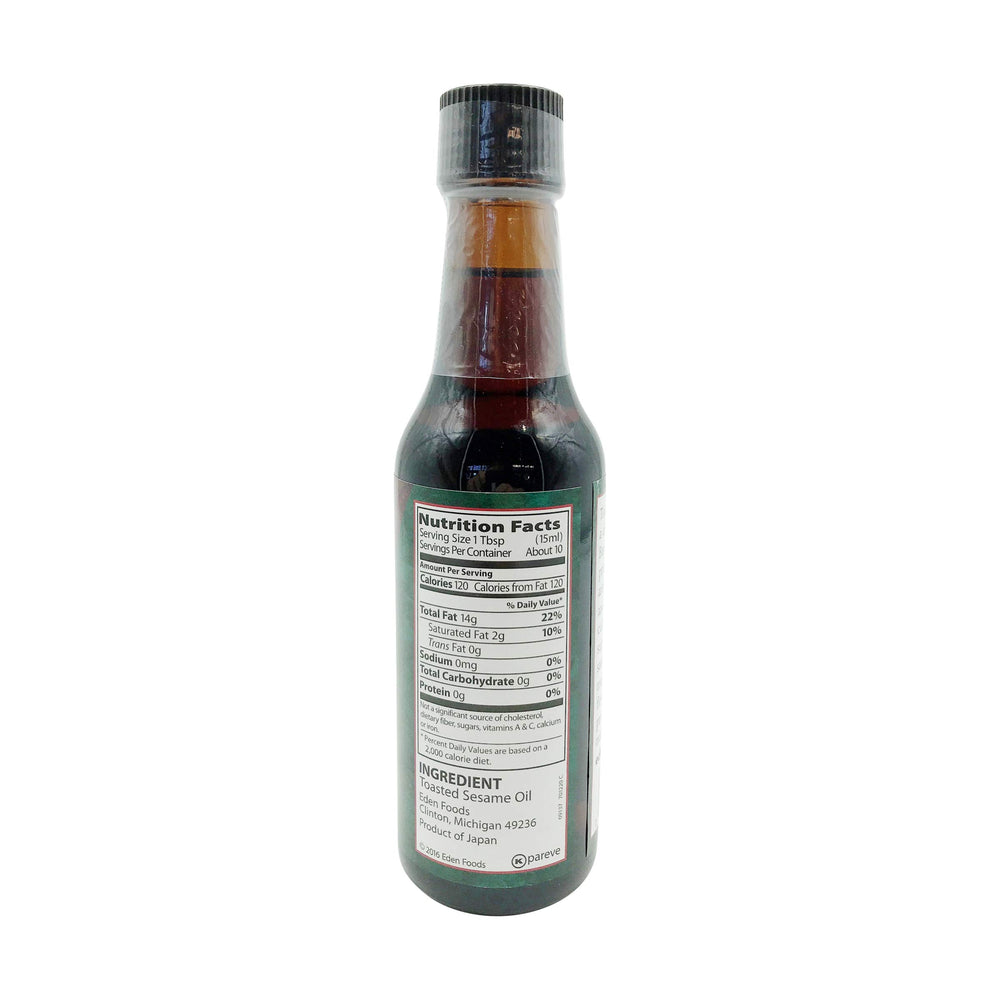 Eden Foods Sesame Oil Toasted pour closeup showing rich aroma for sautéing
