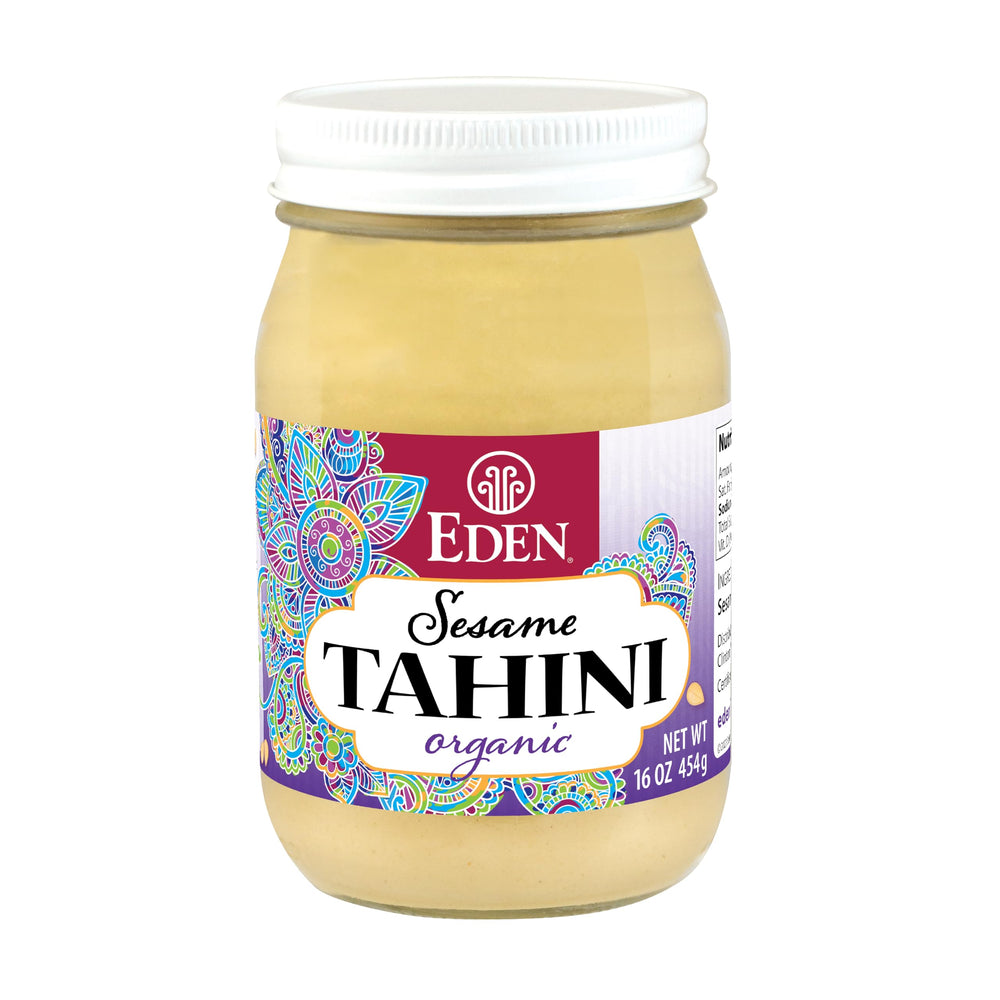 Eden Organic Roasted Tahini in a glass jar, silky texture for creamy hummus and sauces.