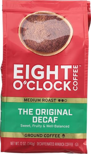 Eight O'Clock decaf brew cup with steam conveying inviting aroma and caffeine-free comfort.