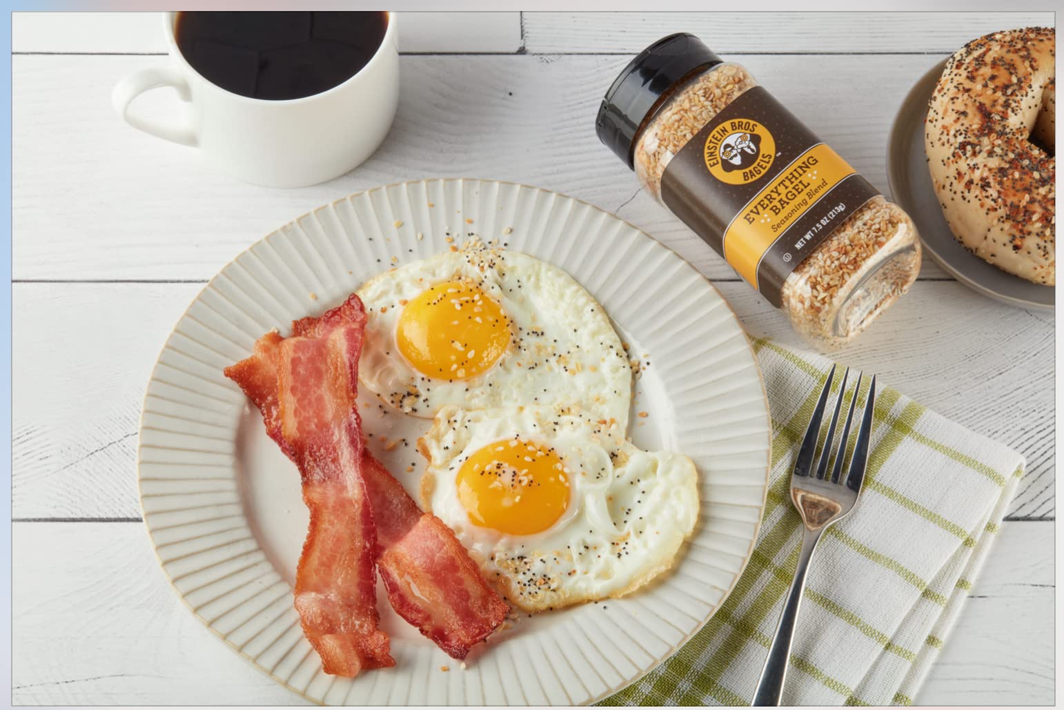 Salad topped with Einstein Bros Everything Bagel Seasoning offers a savory pop