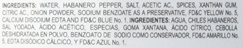 El Yucateco Green Habanero sauce close-up with fresh peppers.