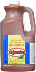 El Yucateco Red Habanero Hot Sauce bottle being poured to add bold heat