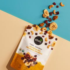 Close-up of vegan dark chocolate with cranberries and banana chips in Elan Oh Mega Mix