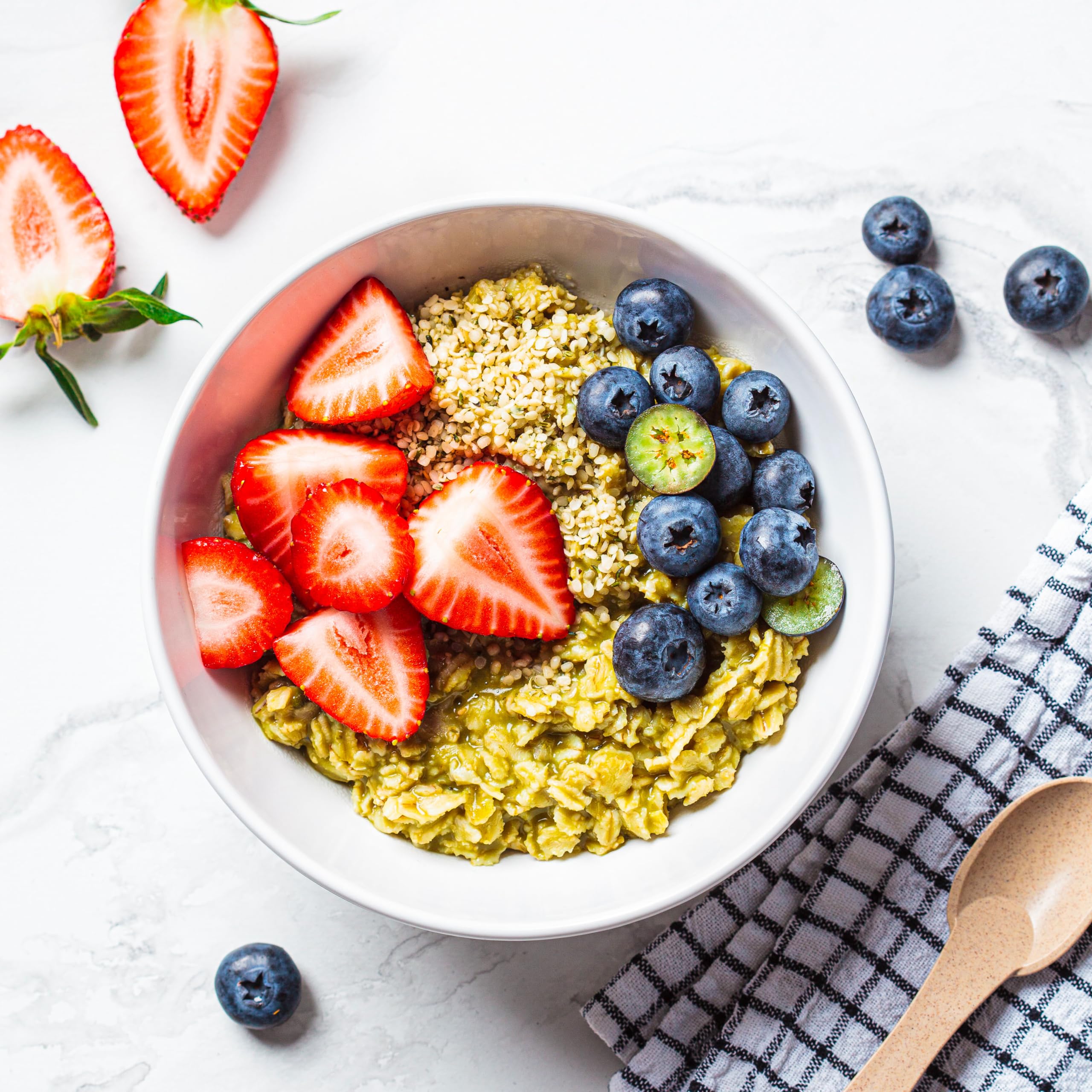 Elan hemp seeds in measuring cup for portion-controlled snacking.