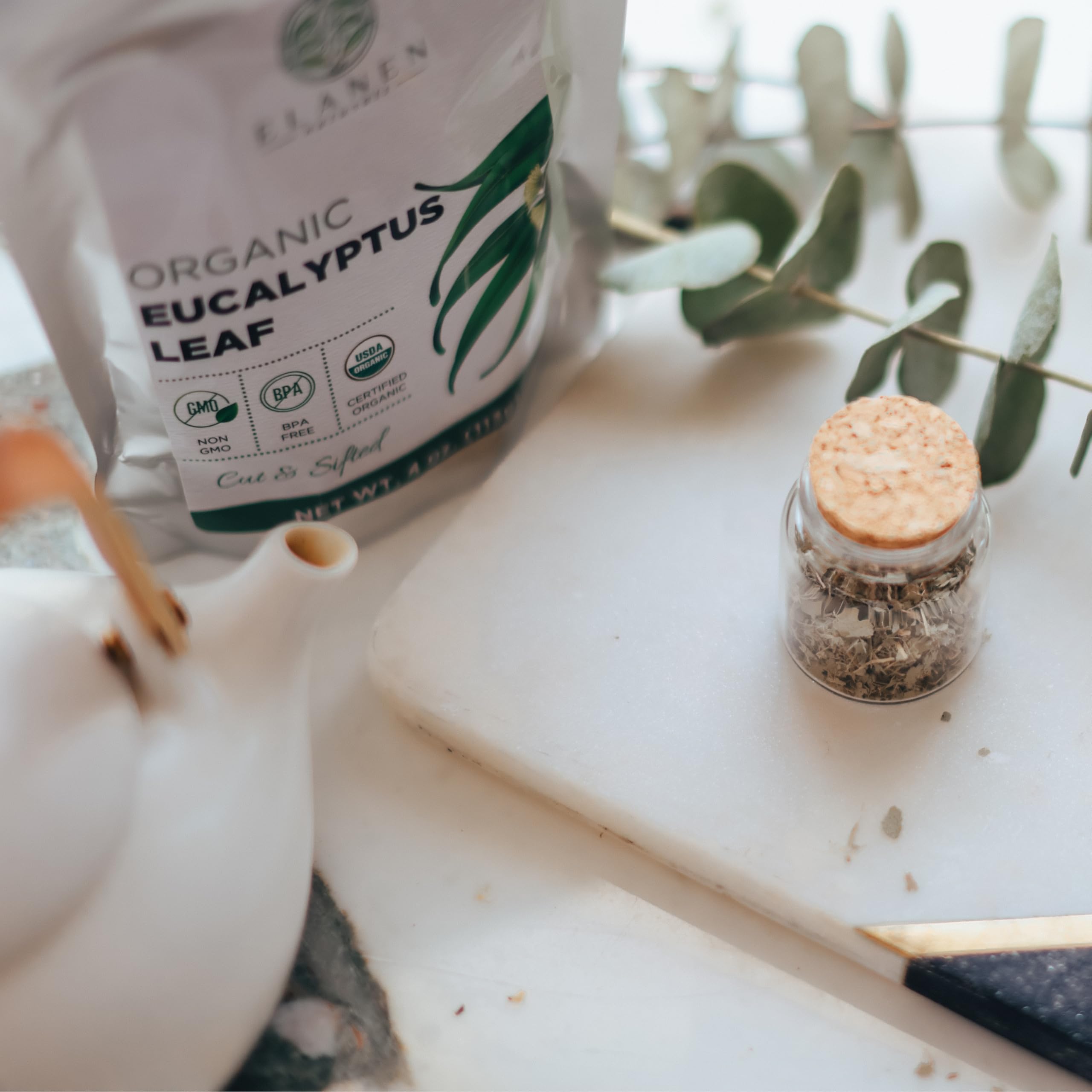 Elanen Naturals eucalyptus leaf tea green leaves field evoking sustainable farming