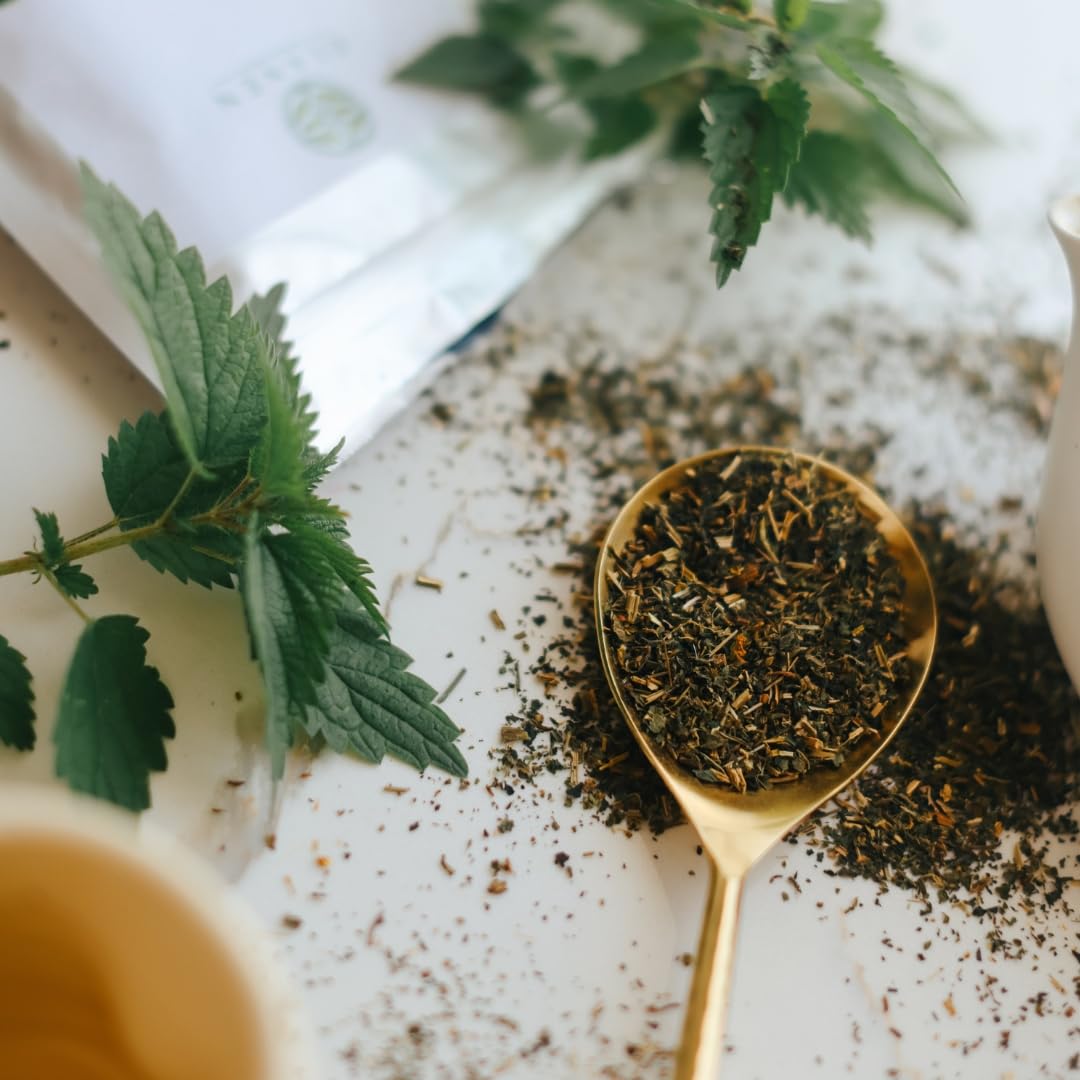 Elanen Naturals cup of nettle tea, steam rising, comforting ritual.