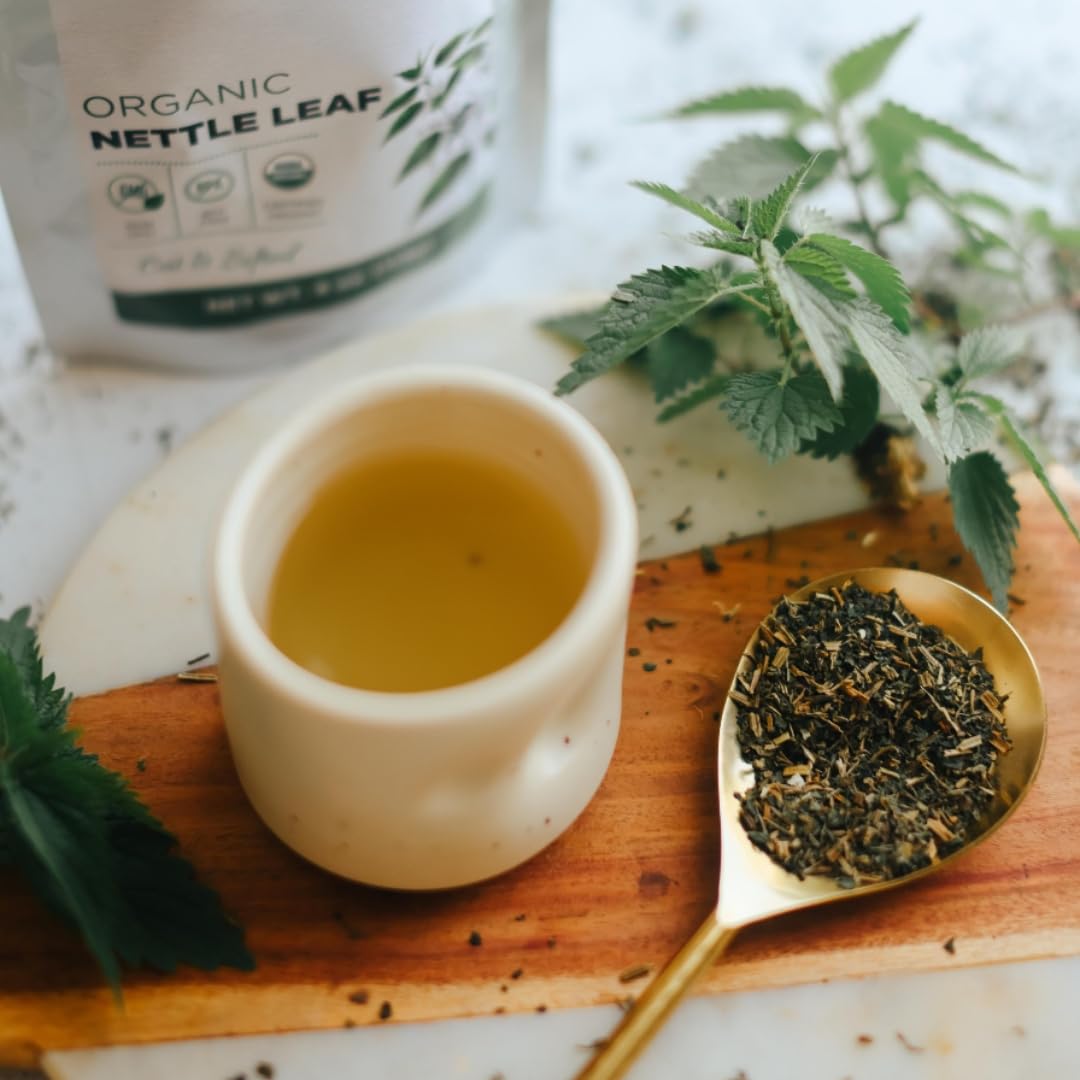 Elanen Naturals tea brewing scene, hot water awakening earthy aroma.