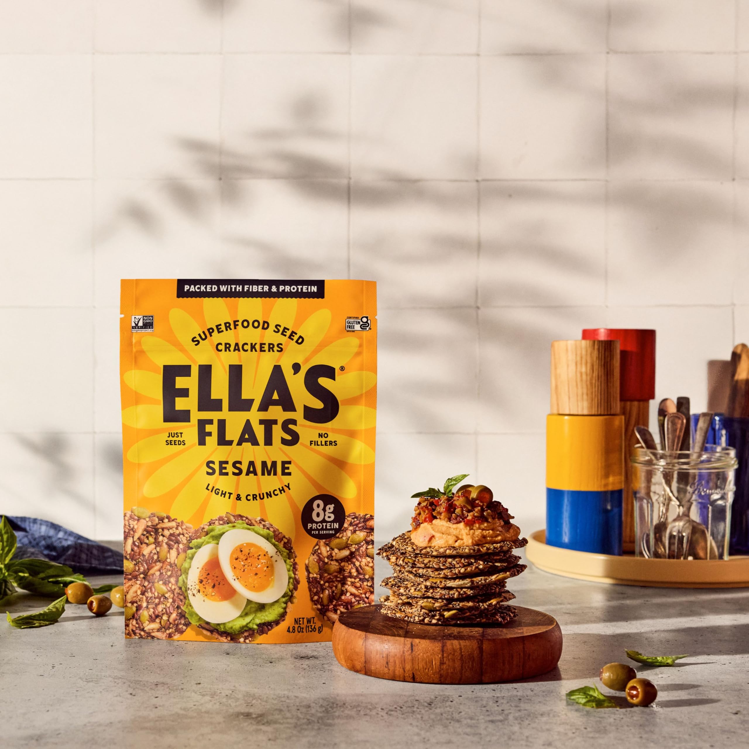 Ella's Flats sesame crisps on cheese board.