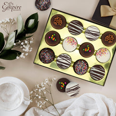 Empire Delights chocolate-covered cookies with toppings offer a decadent treat and vibrant detail.