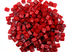 Emporium Candy Cherry Licorice Bites macro texture reveals the smooth surface and sheen.