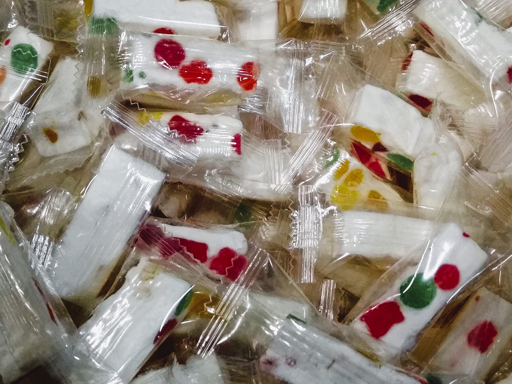 Emporium Candy Jube Nougats feature assorted fruity flavors for quick, convenient snacks.