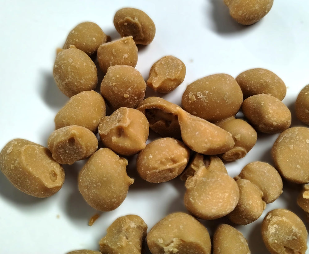 Emporium Candy Maple Double Dipped Peanuts in a mason jar, pantry-friendly snack.