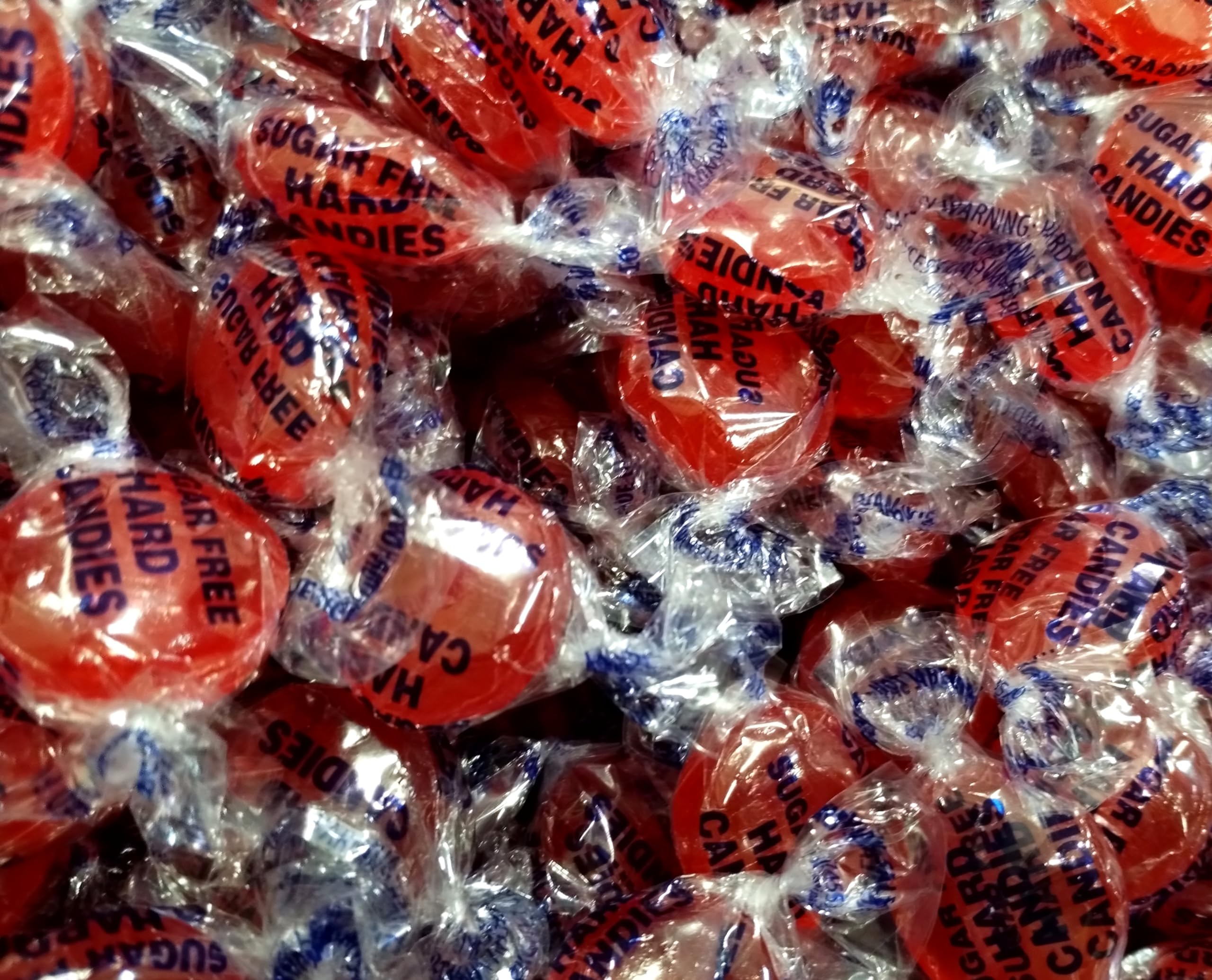 Emporium Candy sugar-free cinnamon buttons packaging closeup emphasizes portable wrappers