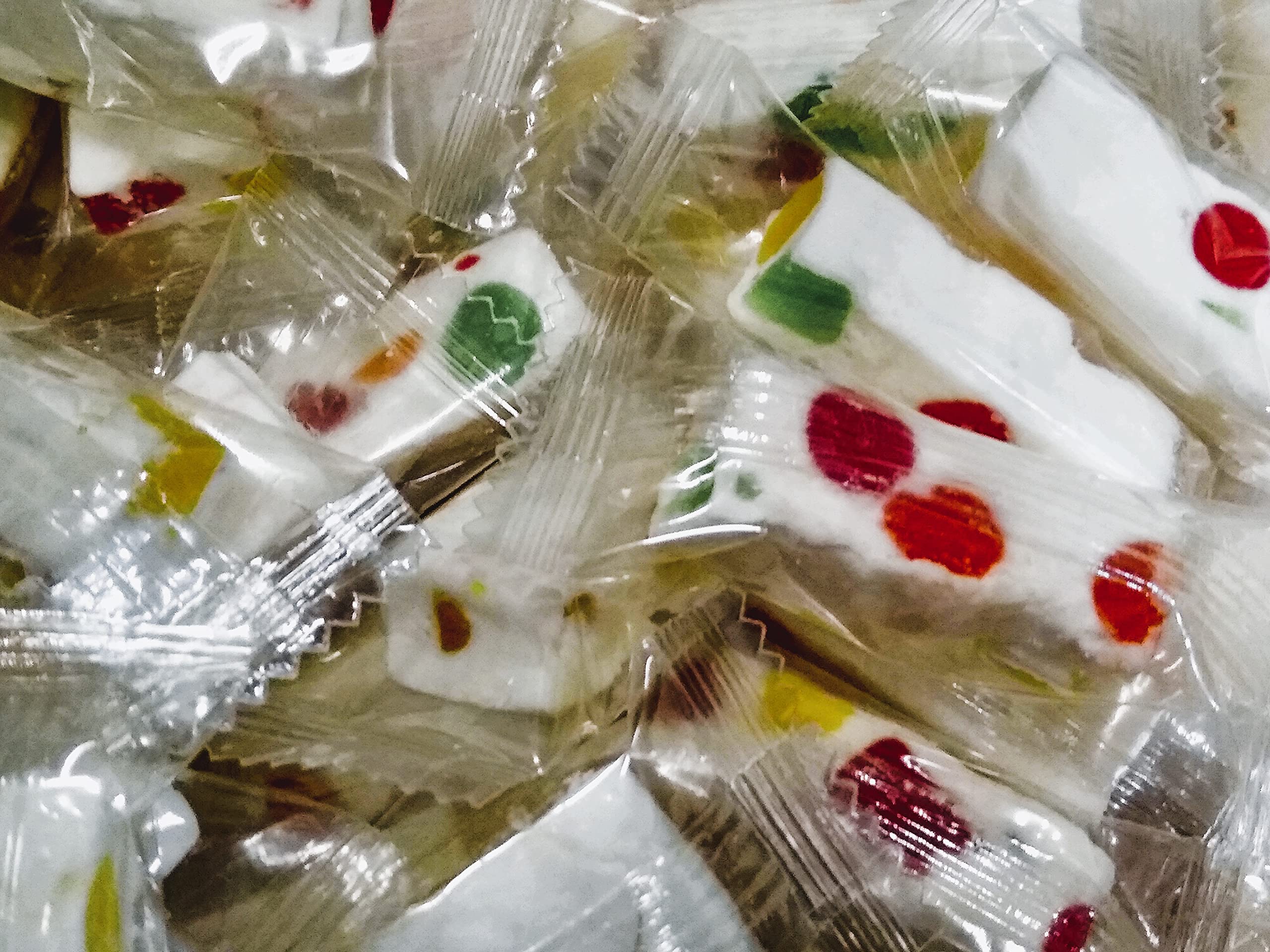 Emporium Candy Wrapped Jube Nougats 8oz in colorful pieces for on-the-go snacking.