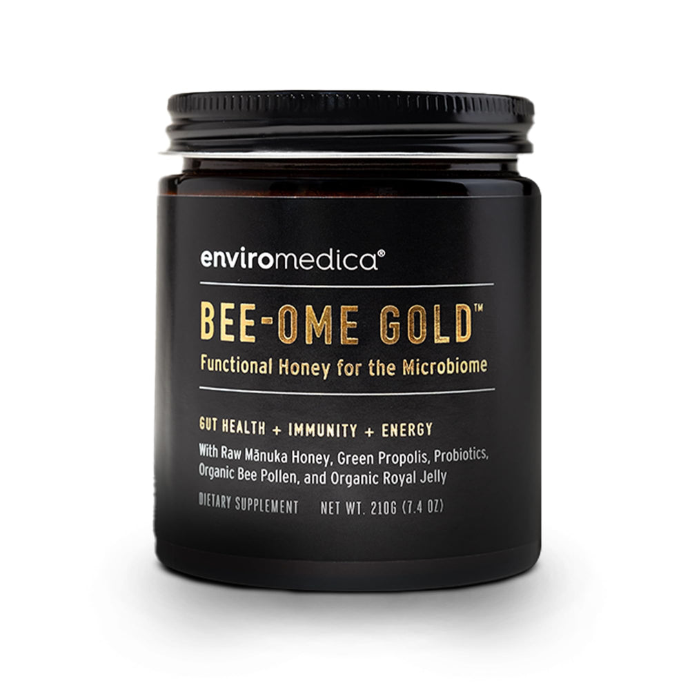 Enviromedica Bee-Ome Gold bottle close-up highlighting raw Manuka honey richness for daily support