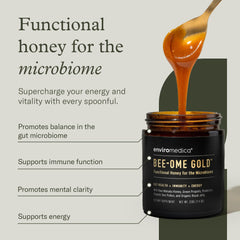 Bee-Ome Gold spoon-dip demonstrates probiotic-rich honey for a gut-friendly daily ritual