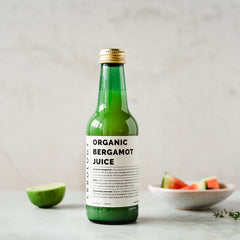 Erbology bergamot juice glass tasting highlights refreshing citrus notes for sipping