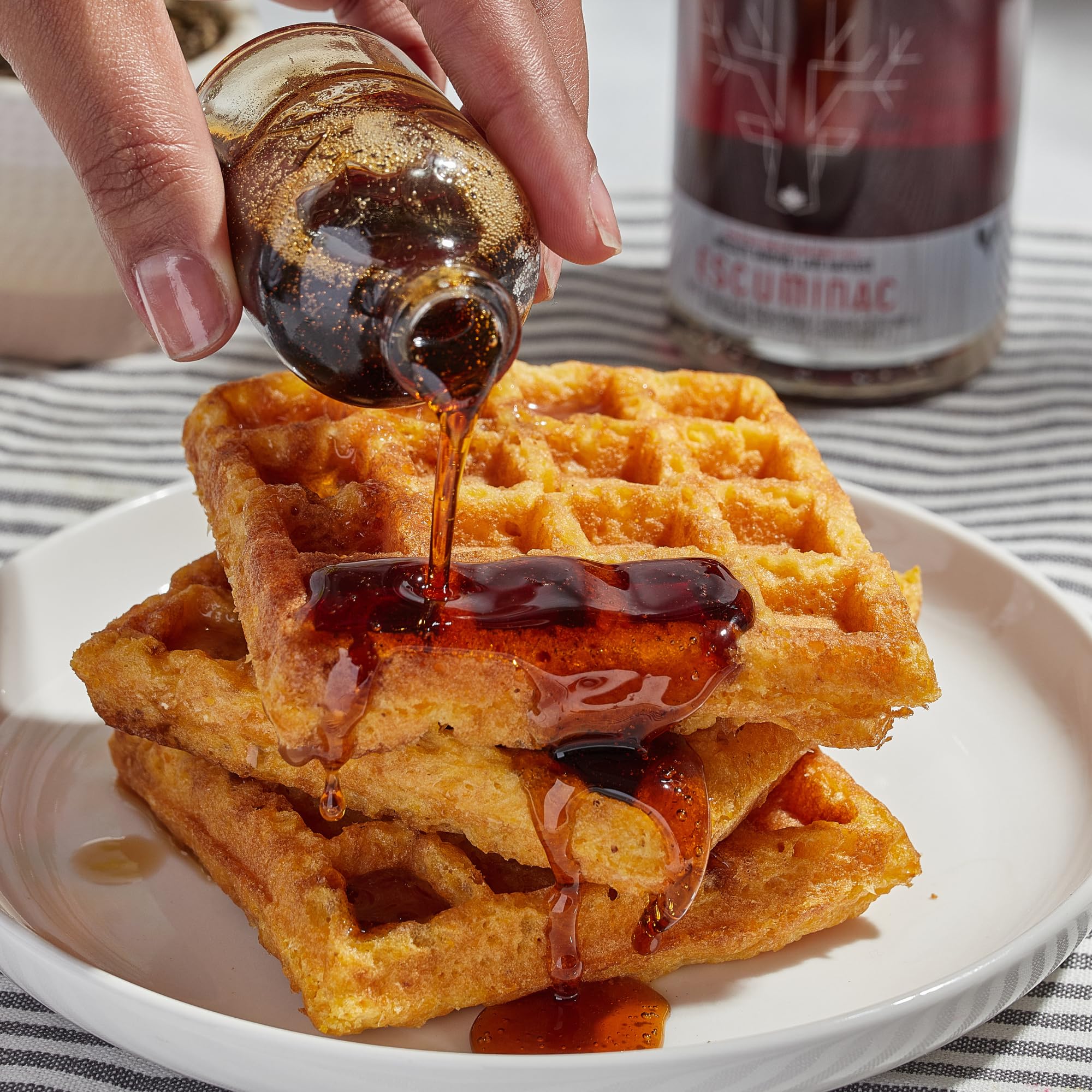 Escuminac syrup over desserts for rich sweetness